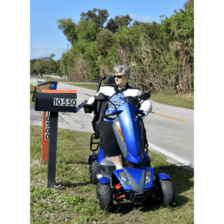 A Person Riding a Blue EV Rider Vita Monster Scooter