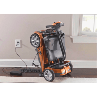 Jupiter Gold Auto Fold Transport 4AF Mobility Scooter Connected to Charger