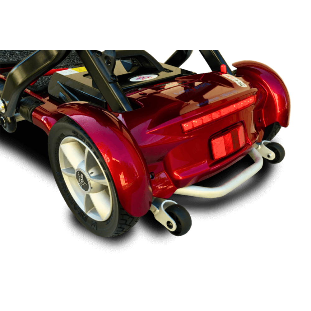 Open Box Red Transport Plus Foldable Mobility Scooter Rear Wheel Close-Up